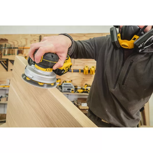 Aku excentrická bruska DeWALT DCW211NT, 125 mm, bez akumulátorů, v kufru